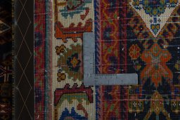 Close-up detail of 2000s Shiraz rug from Iran / Persia showing Wool weave