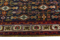 Close-up detail of 2000s Shiraz rug from Iran / Persia showing Wool weave