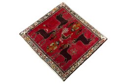 Corner detail of 2000s Shiraz rug showing border pattern and Wool pile