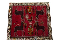Surface texture of 2000s Shiraz rug with natural Wool and intricate pattern