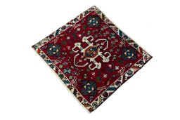 Corner detail of 2000s Shiraz rug showing border pattern and Wool pile