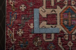 Backside of handmade 2000s Shiraz rug showing knot structure and weave density