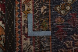 Close-up detail of 2000s Shiraz rug from Iran / Persia showing Wool weave