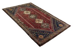 Close-up detail of 2000s Shiraz rug from Iran / Persia showing Wool weave