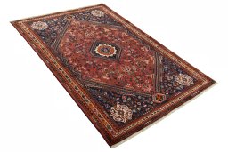 Close-up detail of 2000s Shiraz rug from Iran / Persia showing Wool weave