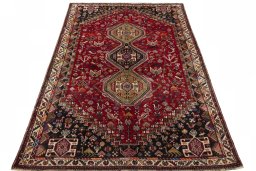 Surface texture of 2000s Shiraz rug with natural Cotton and intricate pattern