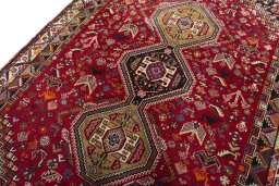 Backside of handmade 2000s Shiraz rug showing knot structure and weave density