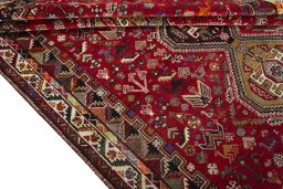 Full view of 2000s Shiraz rug from Iran / Persia, 266 × 180 cm in Red tones