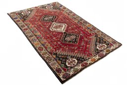 Close-up detail of 2000s Shiraz rug from Iran / Persia showing Wool weave