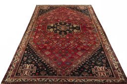 Surface texture of 2000s Shiraz rug with natural Wool and intricate pattern