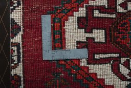 Backside of handmade 2000s Shiraz rug showing knot structure and weave density