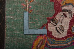 Backside of handmade 2000s Shiraz rug showing knot structure and weave density