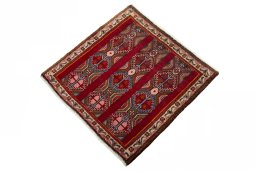 Corner detail of 2000s Shiraz rug showing border pattern and Wool pile