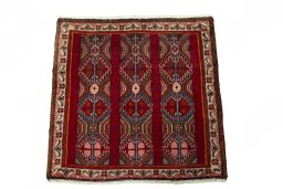 Surface texture of 2000s Shiraz rug with natural Wool and intricate pattern