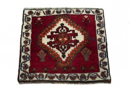 Surface texture of 2000s Shiraz rug with natural Wool and intricate pattern