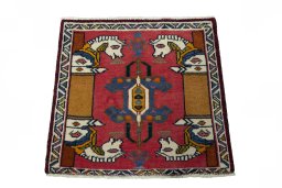 Surface texture of 2000s Shiraz rug with natural Wool and intricate pattern