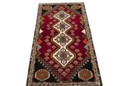 Surface texture of 2000s Shiraz rug with natural Wool and intricate pattern