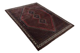Close-up detail of 2000s Shiraz rug from Iran / Persia showing Cotton weave