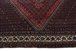 Central medallion detail of 2000s Shiraz rug from Iran / Persia