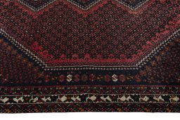 Close-up detail of 2000s Shiraz rug from Iran / Persia showing Cotton weave