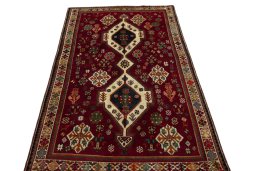 Surface texture of 2000s Shiraz rug with natural Wool and intricate pattern