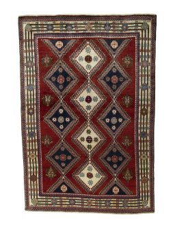 Full view of 2000s Shiraz rug from Iran / Persia, 252 × 173 cm in Red tones