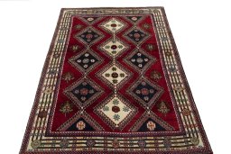 Surface texture of 2000s Shiraz rug with natural Wool and intricate pattern