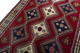 Backside of handmade 2000s Shiraz rug showing knot structure and weave density