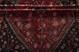 Corner detail of 1970s Shiraz rug showing border pattern and Wool pile