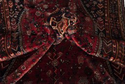 Close-up detail of 1970s Shiraz rug from Iran / Persia showing Wool weave