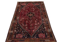 Surface texture of 1970s Shiraz rug with natural Wool and intricate pattern