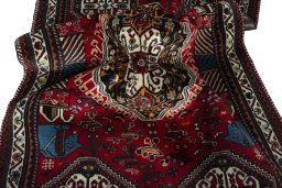 Close-up detail of 2000s Shiraz rug from Iran / Persia showing Wool weave