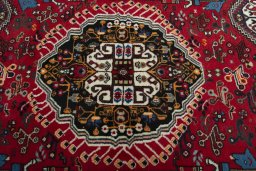 Central medallion detail of 2000s Shiraz rug from Iran / Persia