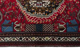 Full view of 2000s Shiraz rug from Iran / Persia, 163 × 112 cm in Red tones