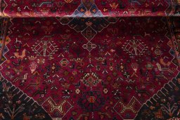 Corner detail of 2000s Shiraz rug showing border pattern and Wool pile