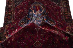 Close-up detail of 2000s Shiraz rug from Iran / Persia showing Wool weave