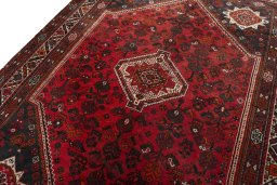 Backside of handmade 2000s Shiraz rug showing knot structure and weave density