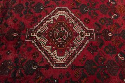 Central medallion detail of 2000s Shiraz rug from Iran / Persia
