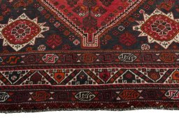 Close-up detail of 2000s Shiraz rug from Iran / Persia showing Wool weave