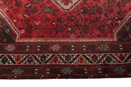 Full view of 2000s Shiraz rug from Iran / Persia, 295 × 206 cm in Red tones