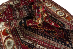 Corner detail of 2000s Shiraz rug showing border pattern and Wool pile