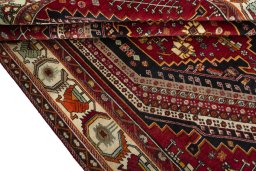 Full view of 2000s Shiraz rug from Iran / Persia, 305 × 206 cm in Red tones