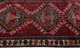 Close-up detail of 2000s Shiraz rug from Iran / Persia showing Wool weave