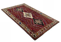 Close-up detail of 2000s Shiraz rug from Iran / Persia showing Wool weave