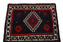 Surface texture of 2000s Shiraz rug with natural Wool and intricate pattern