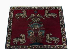 Surface texture of 2000s Shiraz rug with natural Wool and intricate pattern