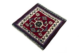 Corner detail of 2000s Shiraz rug showing border pattern and Wool pile