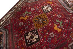 Backside of handmade 2000s Shiraz rug showing knot structure and weave density