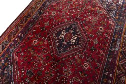 Backside of handmade 2000s Shiraz rug showing knot structure and weave density