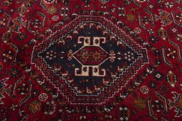 Central medallion detail of 2000s Shiraz rug from Iran / Persia